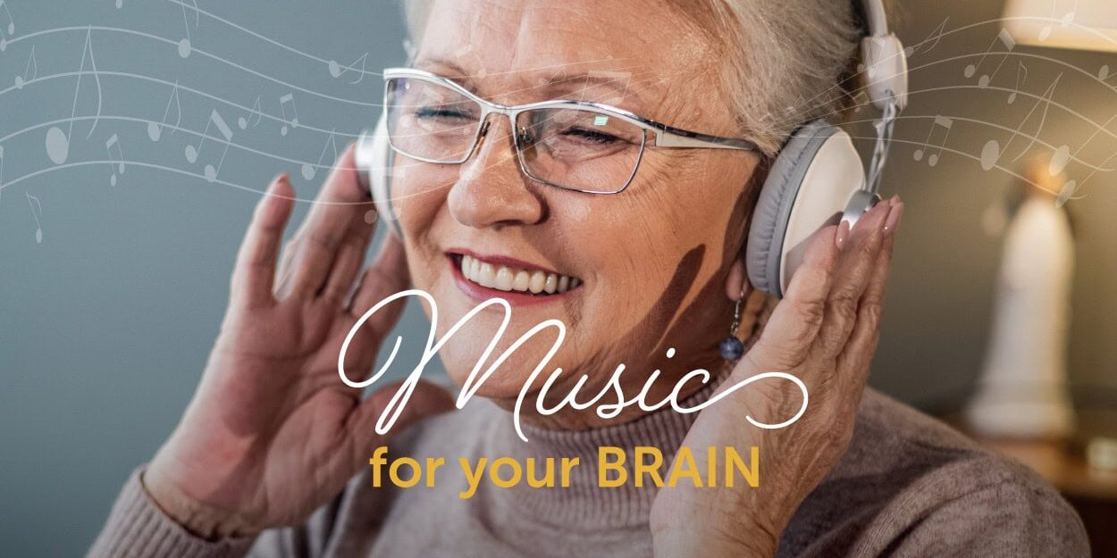 Smiling senior woman listening to music on her headphones